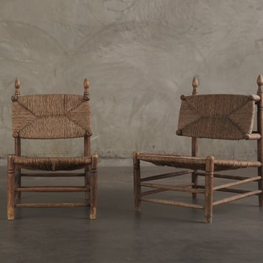 PAIR OF LOUNGE CHAIRS IN THE MANNER OF CHARLOTTE PERRIAND