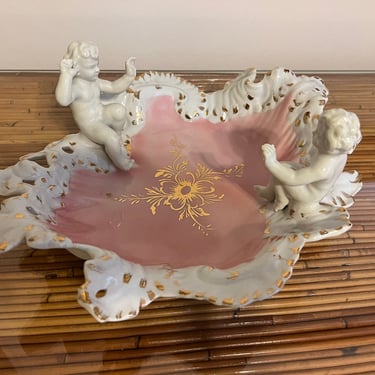 Beautiful hand painted cherub dish in the style of capodimonte. 