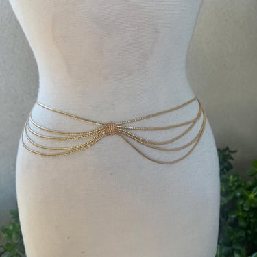 Vintage gold tone belt delicate multi stands fits 28” by Christian Dior. 