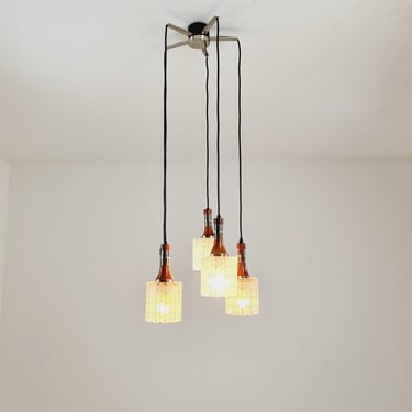 Rosewood and glass pendant lamp, Doria light fixture, with five Murano textured glass tube pendants, 1970s 