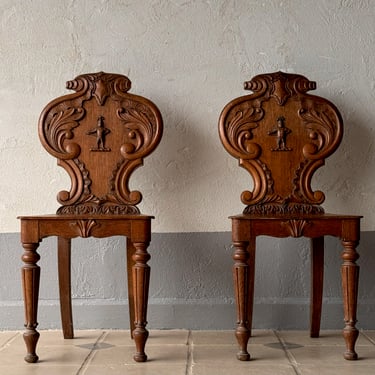 Pair of 19th C. Oak Hall Chairs with Knight Motif
