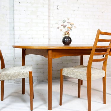 Vintage mcm oval teak dining table with 2 extension leafs made in Denmark | Free delivery in NYC and Hudson Valley areas 