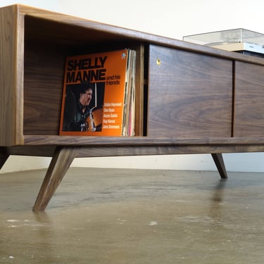 The "BlackPearl" is a mid century modern  console -designed for records, turntable, and audio equipment. 