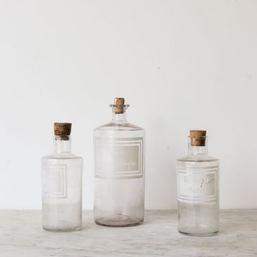 Trio of Antique Pharmacy Bottles