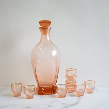 midcentury french pink rosaline glass decanter and gold rimmed glasses