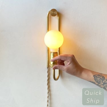 Plug-in wall sconce • The 