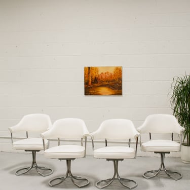 Set of 4 Swivel 1970’s White Chairs