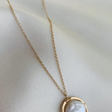 Framed pearl necklace