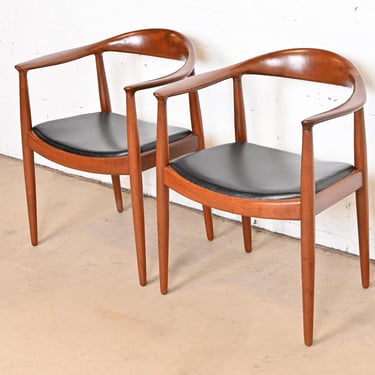 Hans Wegner for Johannes Hansen “The Chair” Teak and Leather Round Chairs, Pair, Newly Restored
