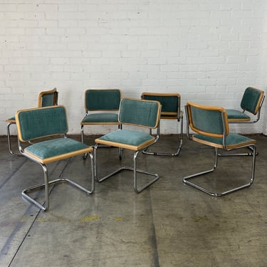 Teal cantilevered chrome chairs - set 