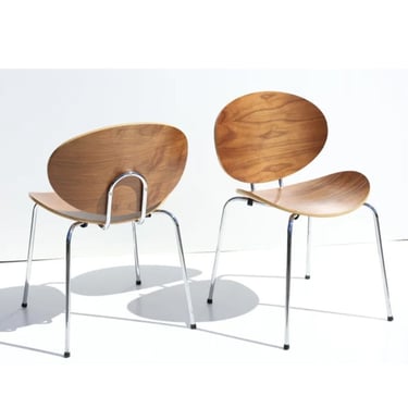 SET OF FOUR STACKING MOLDED PLYWOOD 'POTATO CHIP' CHAIRS