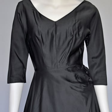 1950s black satin party dress with side bow XS 