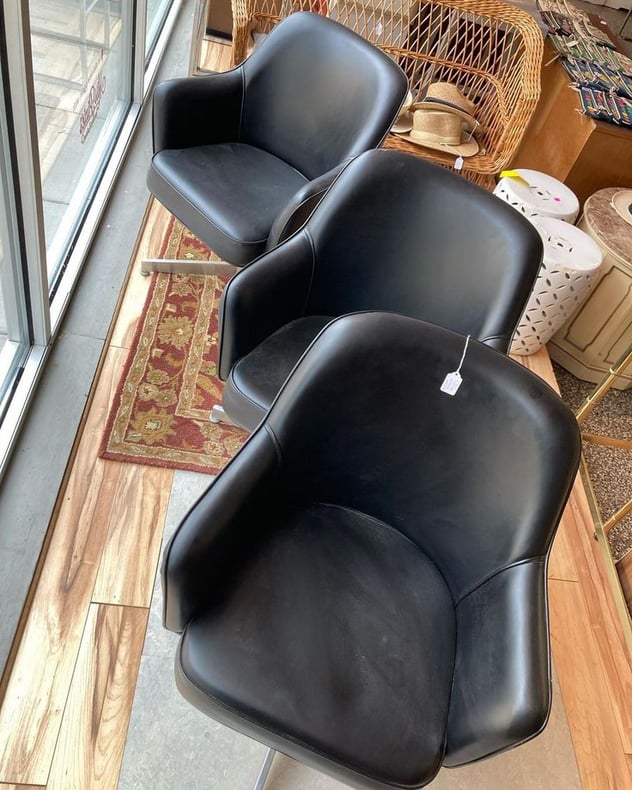 Black vinyl swivel chairs. 3 available 23” x 20” x 32.5” seat height 17.5” Call 202-232-8171 to purchase