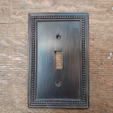 Beaded Light Switch Faceplate with Aged Bronze Finish