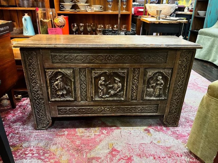 Rustic trunk with carved panels. 41.5” x 15” x 23” 