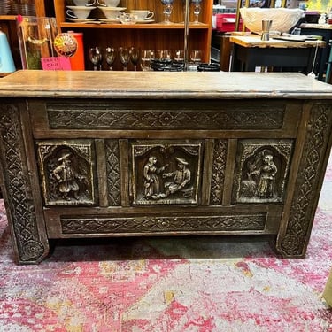 Rustic trunk with carved panels. 41.5” x 15” x 23” 