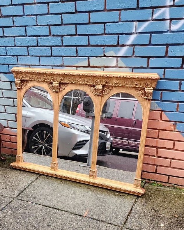 Decorative Triple Mirror. Gilt style frame. Looks great over a dresser or buffet! 50x36".