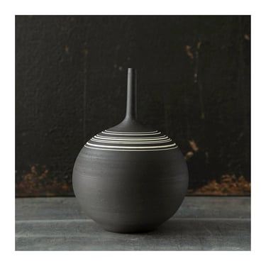 One stoneware vase, rotund shape, raw unglazed black clay with inlaid porcelain striped by Sara Paloma Pottery 
