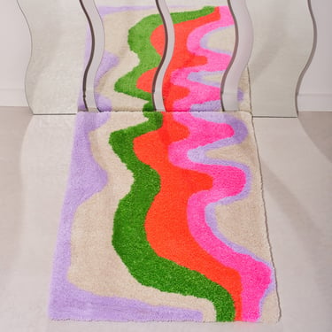 Handmade Tufted Rug in Wavy Pink Red Purple Green Rainbow design, retro 70s style, accent rug. 