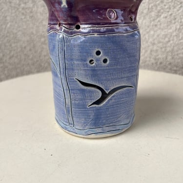 Vintage studio art pottery candle holder luminary purple blue pastels glaze bird theme signed Rowe. Very good condition. Size 5” x 4” weight 