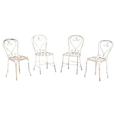 A set of 4 French iron garden chairs, C. 1950.