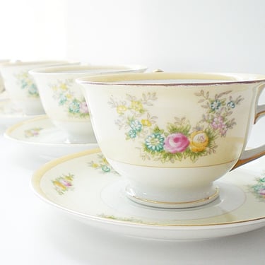 4 Vintage chic china cup and saucer sets for tea or coffee. Collectible hand painted floral on porcelain teacups made in Japan 1960s. 
