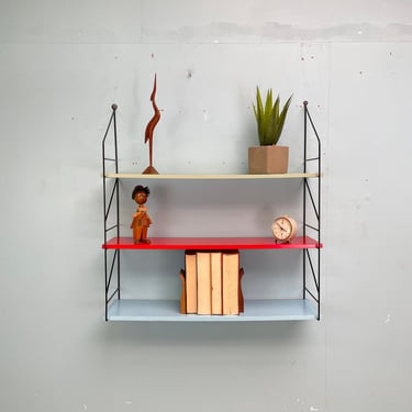 Mid-century teak string shelf from the 1950s 