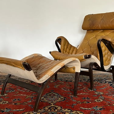 Pernilla leather lounge chair and footstool by Bruno Mathsson for Dux, 1960s 