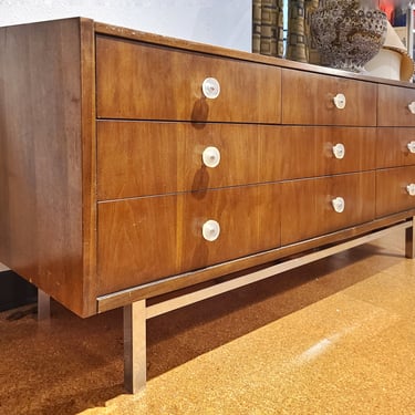 LOW WALNUT NINE-DRAWER DRESSER WITH LUCITE PULLS AND CHROME BASE