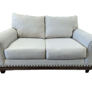 Beige Cloth Studded Loveseat With Wood Trim