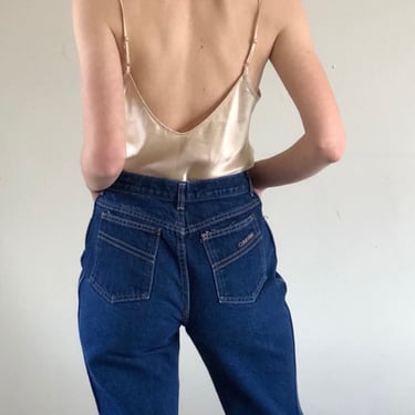 80s Calvin Klein jeans / vintage Calvin Klein designer high waisted medium dark wash straight leg jeans Made in USA | 26x32 