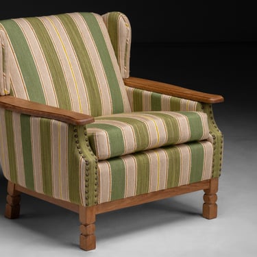 Armchair by Henning Kjaernuff in Christopher Farr Fabric