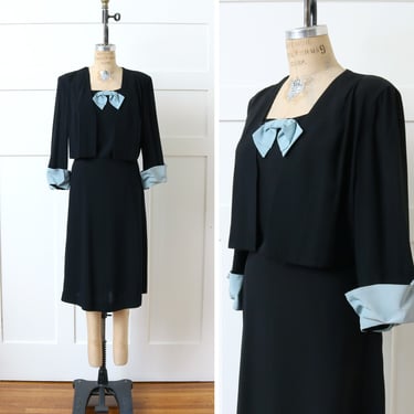 volup vintage 1940s dress • black rayon crepe dress with built in jacket and blue bow accent 