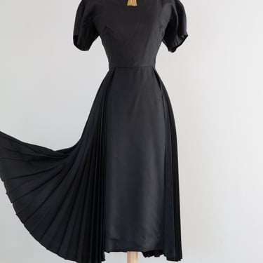 Elegant 1950's Lilli Ann Black Cocktail Dress With Pleated Fly Away Sides / Small