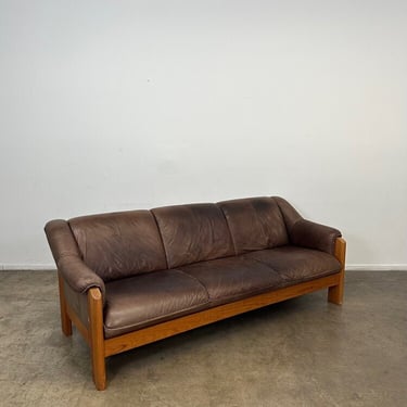 Norwegian distressed leather and teak sofa 