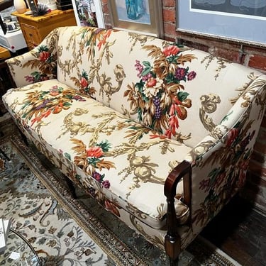 Floral upholstered mahogany sofa. 69” x 28” x 34” seat height 20” Call 202-232-8171 to purchase