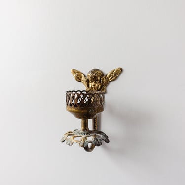 antique french wall mounted cherub candle sconce