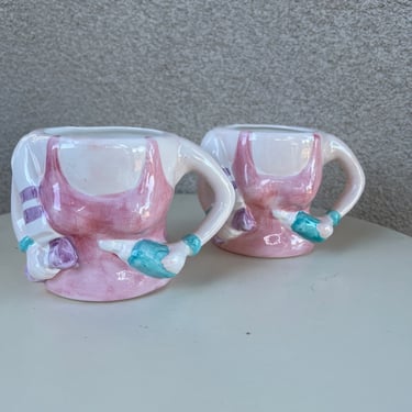 Vintage set 2 ceramic mugs 3D women athletic theme by E&B giftware Fred Hollinger 1993 