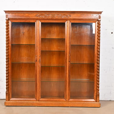 R. J. Horner Style Antique Victorian Carved Oak Lighted Triple Bookcase or Display Cabinet, Circa 1890s