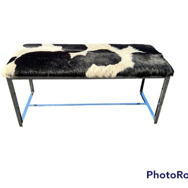 Heavy vintage chrome MCM bench with cowhide upholstery 