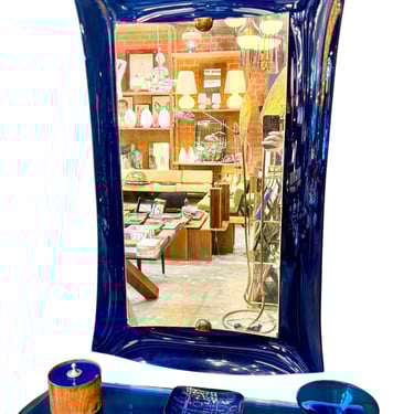 Fontana Arte blue mirror with glass console. Italy 1970