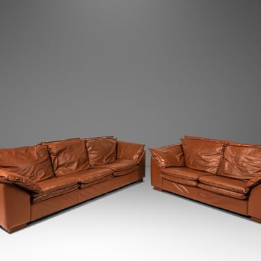 Set of Two (2) Modern Low Profile Sofas in Cognac Brown Leather in the Manner of Niels Eilersen, USA, c. 1990's 