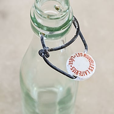 petite French glass milk bottle with porcelain lid