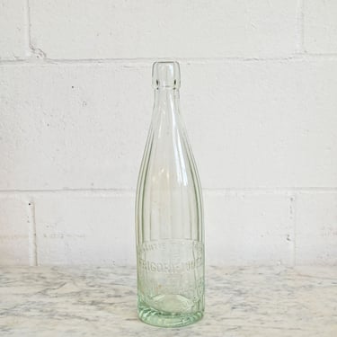 vintage french embossed glass soda bottle