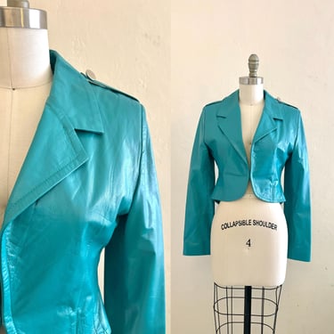 vintage aqua blue leather cropped jacket . 