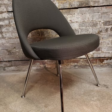 2 Gray Saarinen Executive chairs by Knoll International .