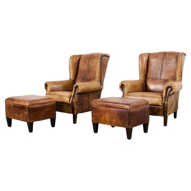 Pair of Distressed Cigar Leather Wingback Chairs with Ottomans