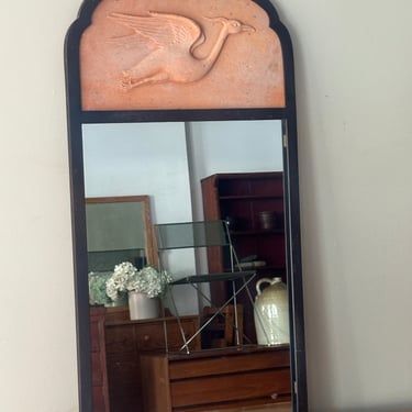Metal and terracotta heron mirror