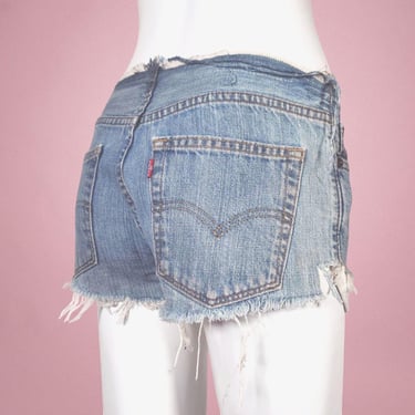 Vintage Levi's booty shorts 90's light wash distressed destroyed faded frayed discolored denim hippie hot pants extreme low rise (25 - 26) 