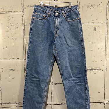 90s, Size 34 waist blue denim orange tab Levi’s 550 denim pants made in USA levis relaxed fit tapered leg unisex 